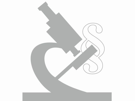 Symboliczna grafika prezentująca mikroskop i paragraf